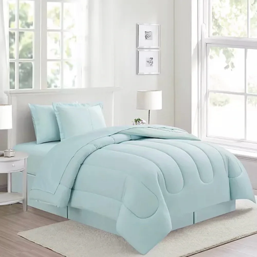 Reversible Color block w a seaside vibe, the Aiden comforter Set.